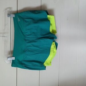 Women's dri-fit Nike running shorts green and bright yellow/green with pockets